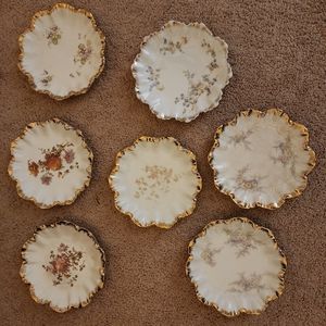 Set of 7 Limoges Porcelain Decorative Plates